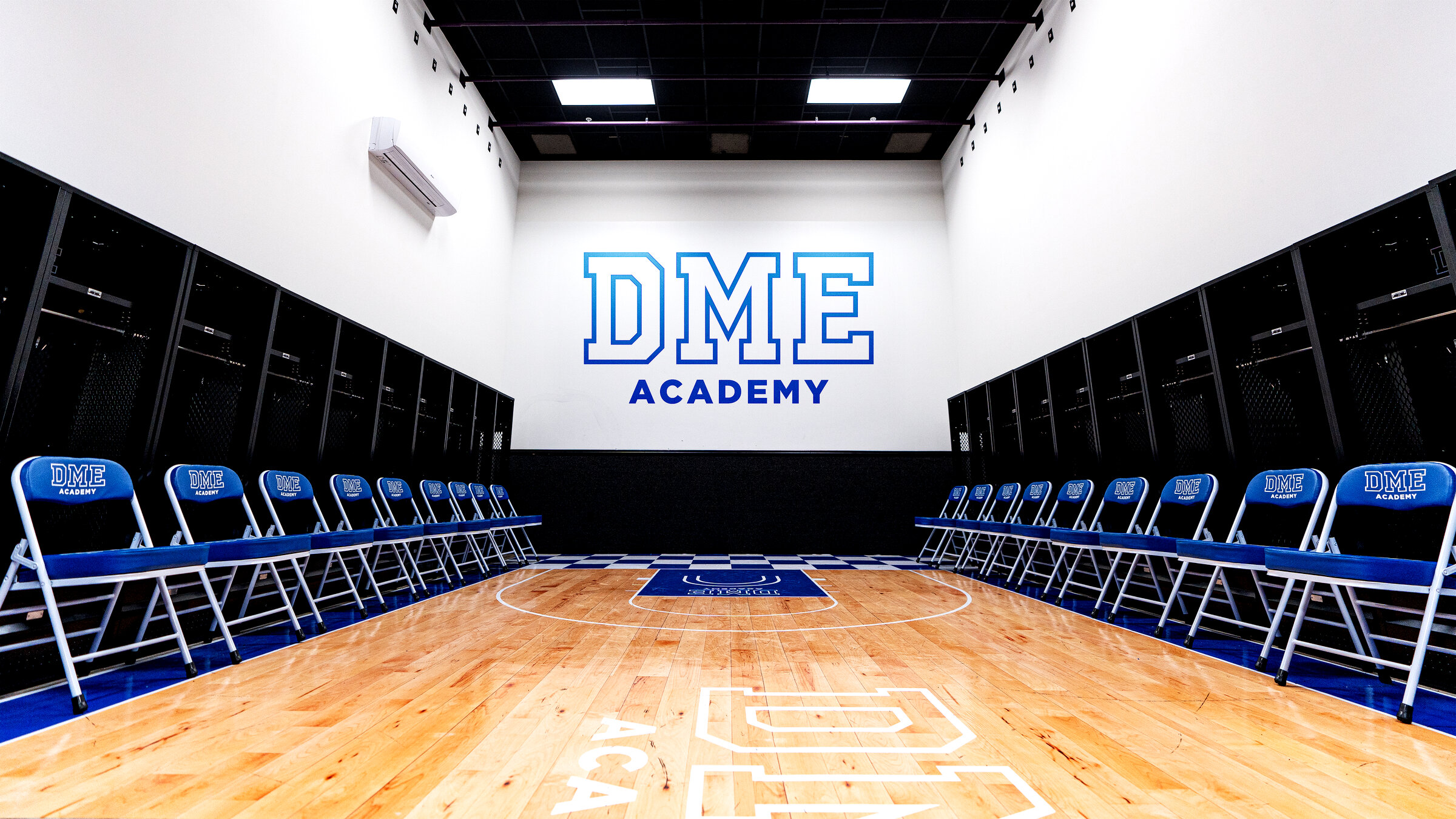 DME Academy branded locker room with clean professional setup